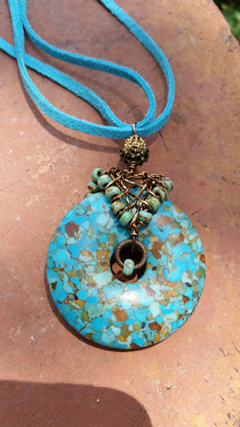Large Turquoise with Antiqued Brass and Beads